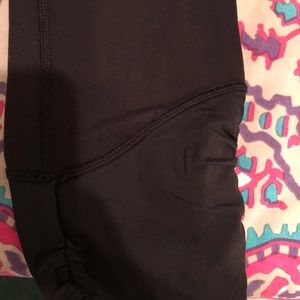 Lululemon black crop leggings with leg detail